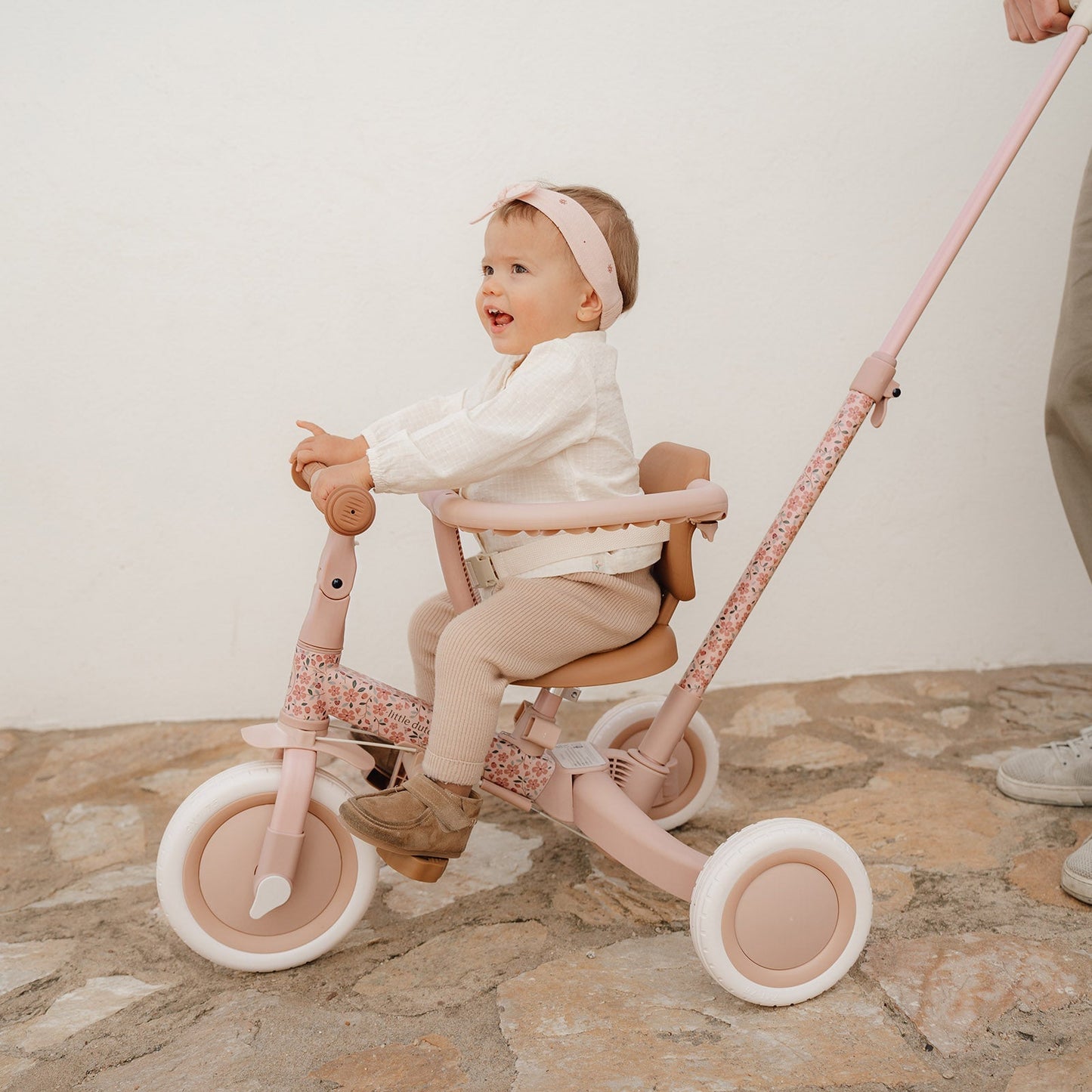 Little Dutch 4 in 1 Pink Tricycle for toddlers with adjustable design and parent push handle
